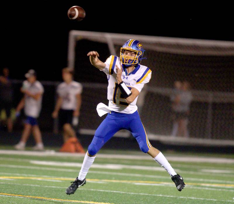 Johnsburg’s  Carter Block throws the ball in varsity football action on Friday, Sept. 13, 2024, at Richmond-Burton High School in Richmond.