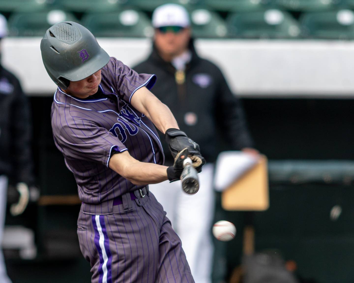 Dixon's Alex Harrison (1) hits a come backer to the pitcher during baseball game between Dixon at Hampshire.  March 28, 2024