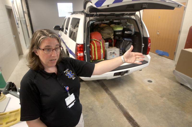 Dr. Jennifer Gibson Chambers introduces the MD-1 response vehicle during a public open house for the new Mercyhealth hospital in Crystal Lake on Saturday. Doctors will use the vehicle to respond alongside first responders at necessary scenes.