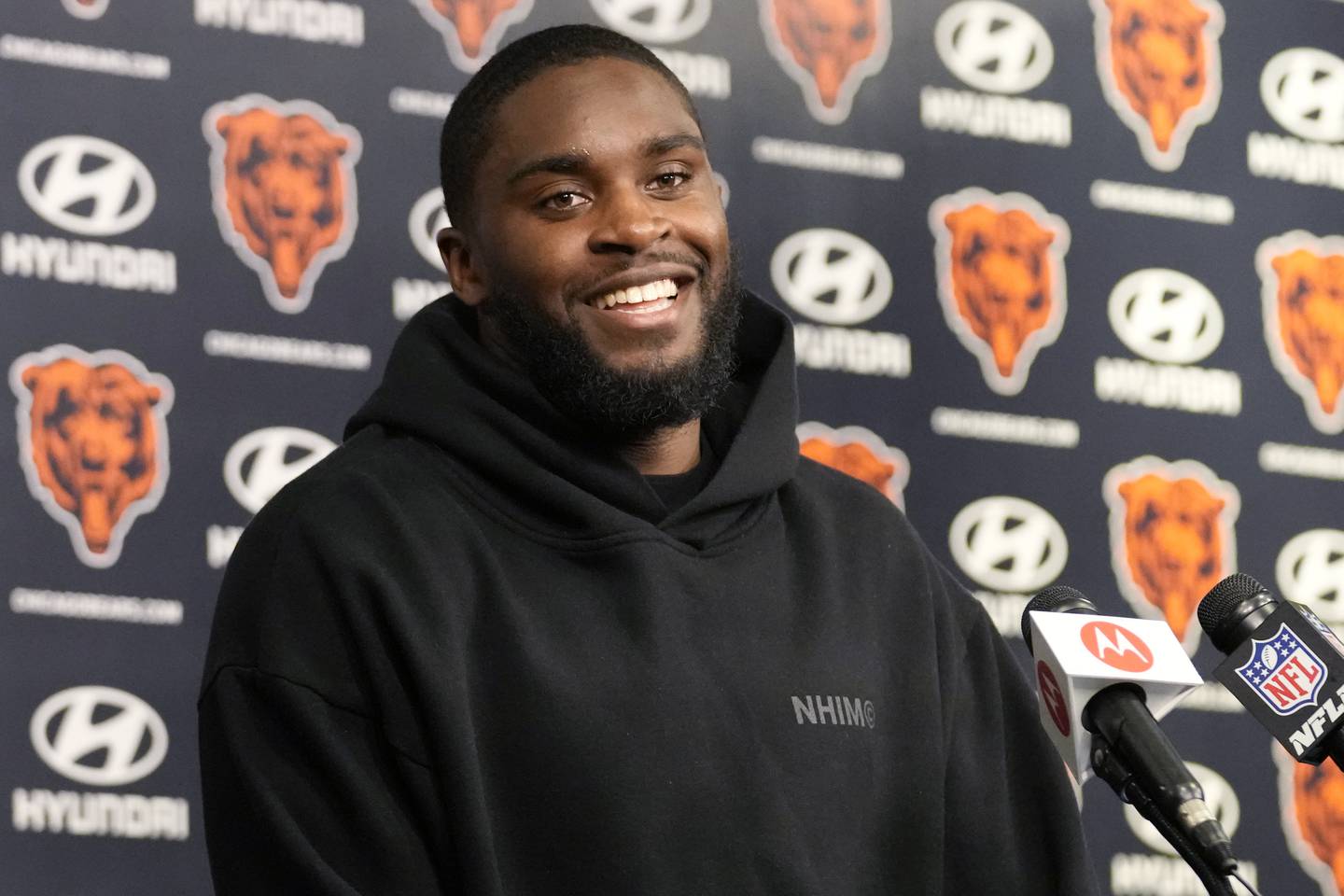 Chicago Bears cornerback Jaylon Johnson smiles as he listens to reporters during a news conference after the NFL team's mandatory minicamp football practice in Lake Forest, Ill., Wednesday, June 5, 2024. (AP Photo/Nam Y. Huh)