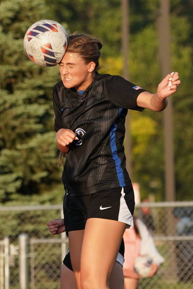 St. Charles North's Kayla Floyd (2) goes up for a header against Batavia during a Class 3A Batavia Regional final soccer match at Batavia High School in Batavia on Friday, May 17, 2024.