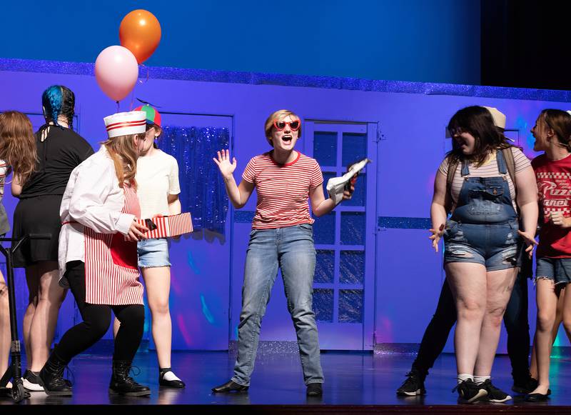 Ottawa freshman Marley Walker reacts in a scene during rehearsal for "Standing Tiptoe," the theater program's spring performance.