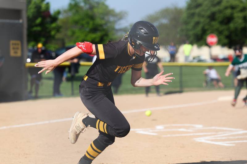 Joliet West’s Shelby Fraser hustles to first off a successful bunt against Plainfield Central on Wednesday, May 15, 2024 in Joliet.