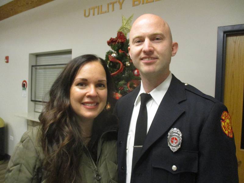 Batavia firefighter-paramedic Joe Zelek was named the Batavia Firefighter of the Year for 2023. He is seen here on Dec. 18, 2023 with his wife Kristen. (Mark Foster)