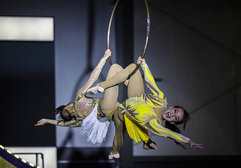 A part of acrobats spin and perform high above the crowd Tuesday, April 2, 2024 at Dixon Park District’s The Facility.