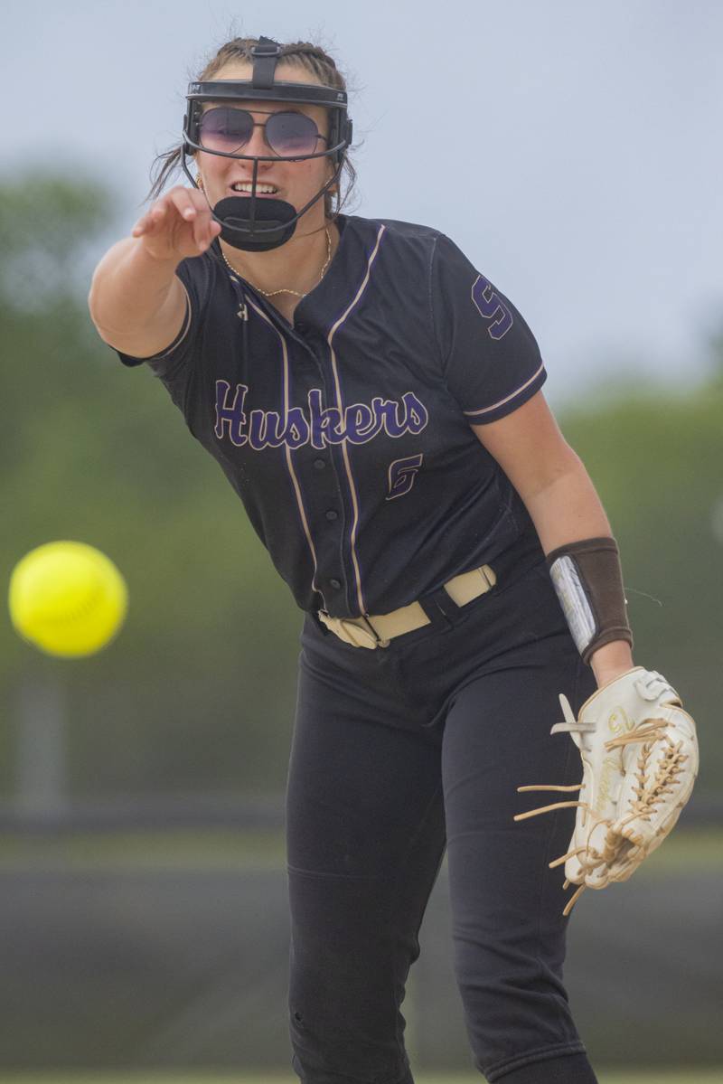 Maddie Glade throws a pitch against a Newark batter during the Class 1A Sectional Final at Woodland High School on May 24, 2024.