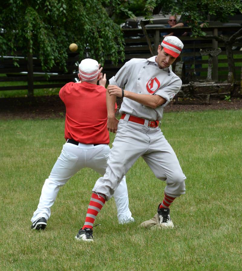 Oregon Ganymede Mike "Smitty" Smith beats the throw to second base during a vintage base ball game against the DuPage Plowboys at the John Deere Historic Site in Grand Detour on Saturday, June 8, 2024.