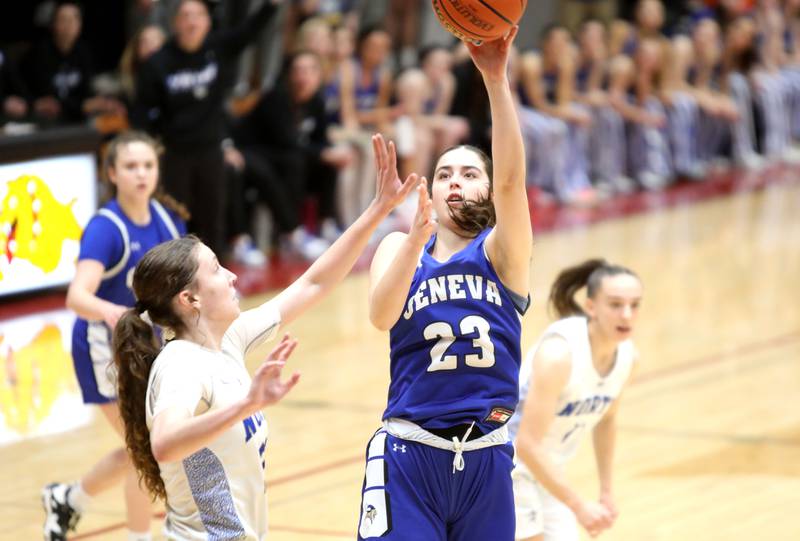 Geneva’s Lucie Garnier shoots the ball over St. Charles North’s Katrina Stack during a Class 4A Batavia Sectional semifinal game on Tuesday, Feb. 20, 2024.