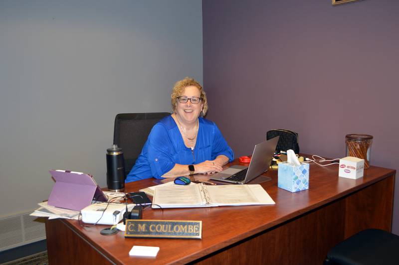 Charlene Coulombe, the new executive director of the Ogle County Economic Development Corp., sits in her office on Wednesday, March 13, 2024.