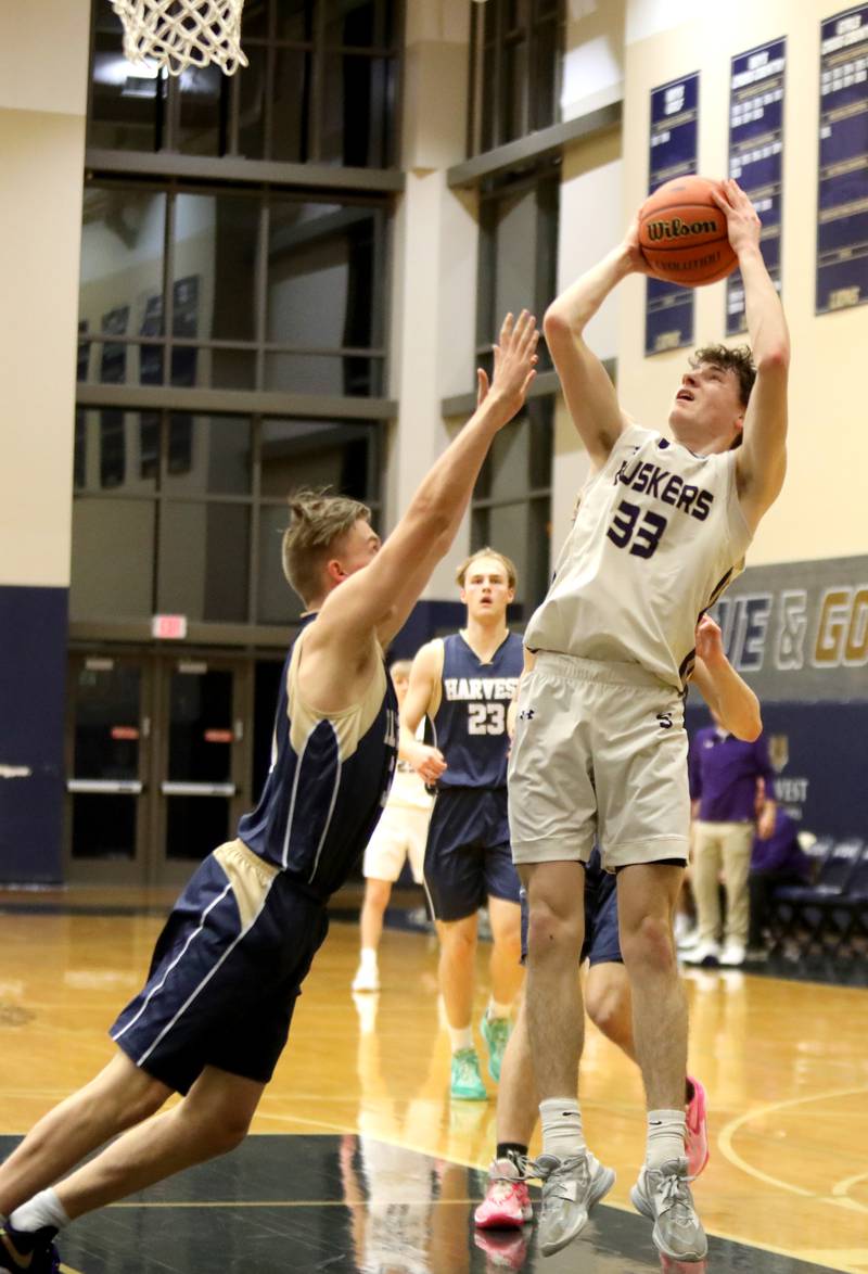 Serena’s Hunter Staton (right) shoots the ball during the Class 1A Harvest Christian Academy Sectional semifinal game against Harvest Christian Academy on Wednesday, Feb. 28, 2024 in Elgin.