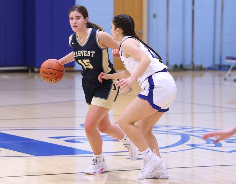 Harvest Christian’s McKenna Nestrick tries get by Hinckley-Big Rock’s Lilliana Martinez Monday, Jan. 8, 2023, during their game at Hinckley-Big Rock High School.