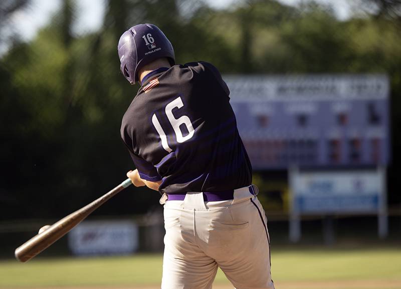 Dixon’s Brady Lawrence drives the ball deep to break a 2-2 against Freeport Thursday, May 23, 2024 during the Class 3A regional semifinal in Dixon.