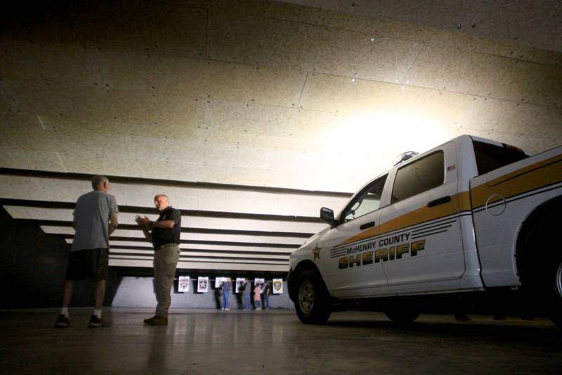 People check out the firing range during an open house at The McHenry County Regional Training Center in Cary Tuesday evening.