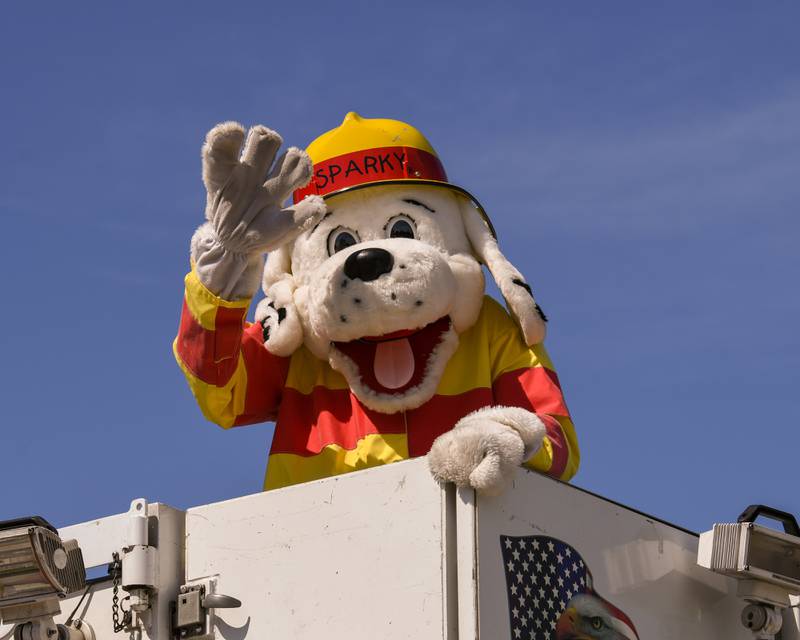 Sparky waves to community members along the Freedom Days parade route held on July 2, 2022 in Sandwich.