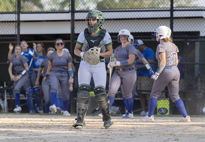 Rock Falls’ Olivia Osbourne walks off the field as Princeton celebrates their win Wednesday, May 15, 2024 a the Class 2A regional softball semifinal.