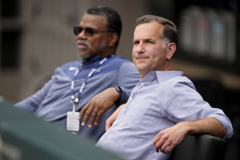 Chicago White Sox Senior Vice President-General Manager Rick Hahn, right, sits with Executive Vice President Kenny Williams, watch the team's batting practice before a baseball game between the White Sox and Kansas City Royals Friday, May 19, 2023, in Chicago.