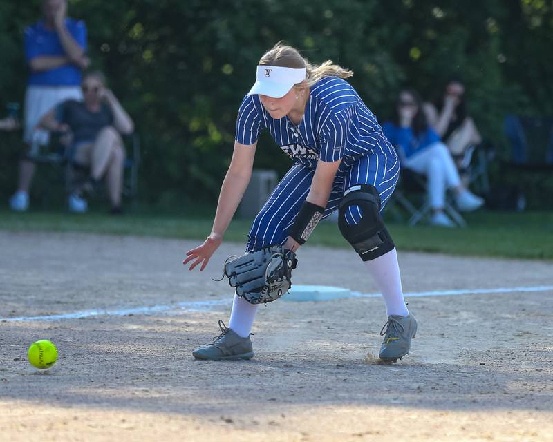 Newark's Gwen Friestad (4) fields a ground ball during Class 1A Newark Regional final game between St. Edwards at Newark. May 17th, 2024.