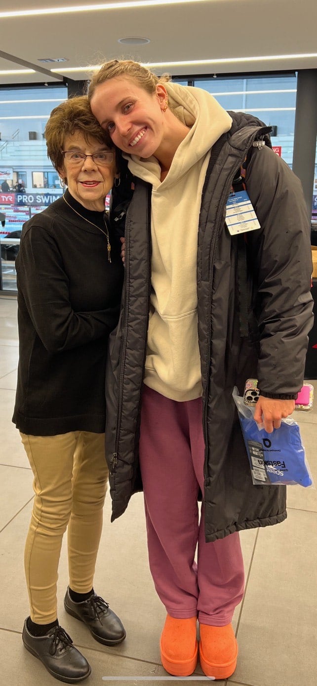 World record swimmer Regan Smith, who will compete in four events at the Paris Olympics, poses for a photo with her grandmother, Marge Moore, who lives in Peru.