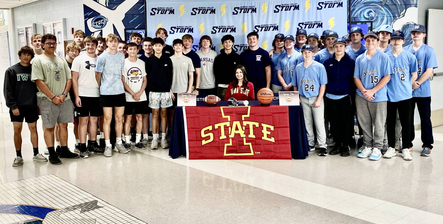 Makenna Maupin is joined by her closest friends from the Bureau Valley football team for her signing to become an equipment manager for the Iowa State University football team this fall. She served as manager for the Storm football, basketball and baseball teams.