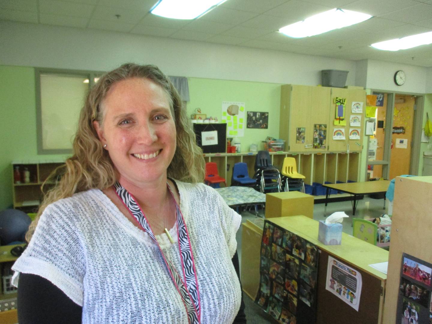 Preschool teacher Gretchen Wheatley's classroom is filled with toys, games, puzzles and books and arranged into play areas for the students.