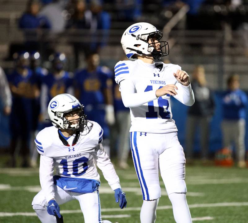 Geneva's Jayden Hodgdon (16) watches his extra point sail through the uprights during the IHSA Class 6A playoff game Friday November 3, 2023 in Lake Forest.