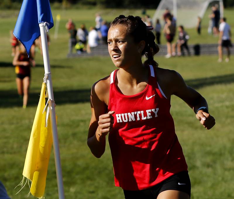 Huntley’s Haley Rahman runs to a first place finish in the girls race of the McHenry County Cross Country Invite on Saturday, August 31, 2024, at McHenry Township Park in Johnsburg.