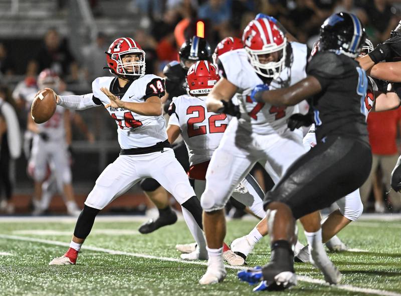 Maine South's Constantine Coines looks to pass the ball  during a non-conference game against Lincoln-Way East on Friday, Aug. 30, 2024, at Frankfort. (Dean Reid for Shaw Local News Network)