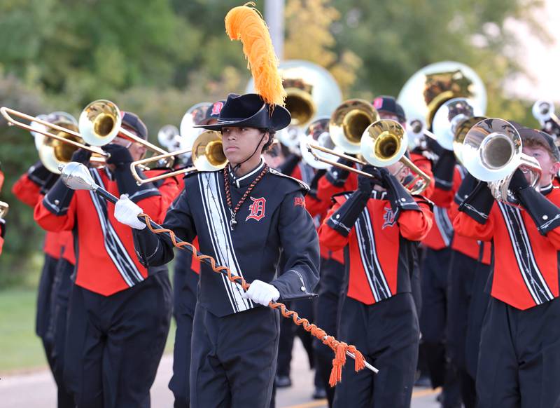 The DeKalb High School marching band makes its way down Dresser Road Wednesday, Oct. 5, 2022, during the school's homecoming parade.
