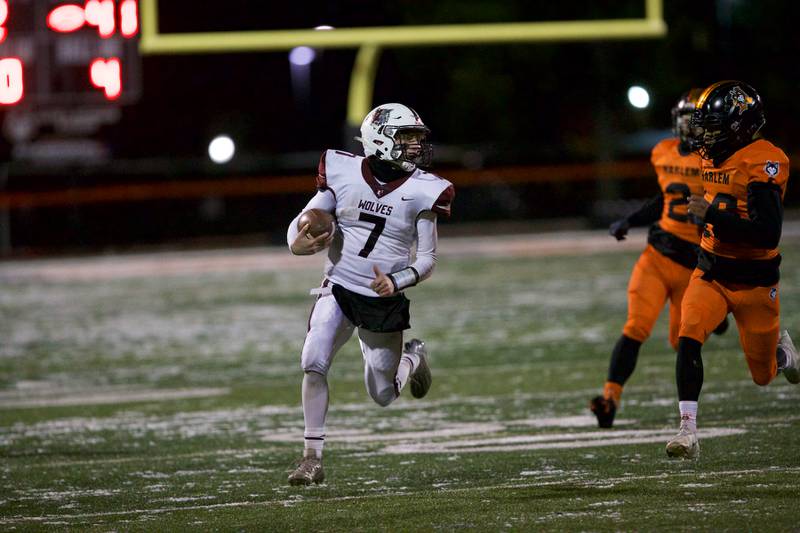 Prairie Ridge's Tyler Vasey runs for a gain at the Class 6A Quarter Finals on Saturday, Nov. 12,2022 in Machesney Park.