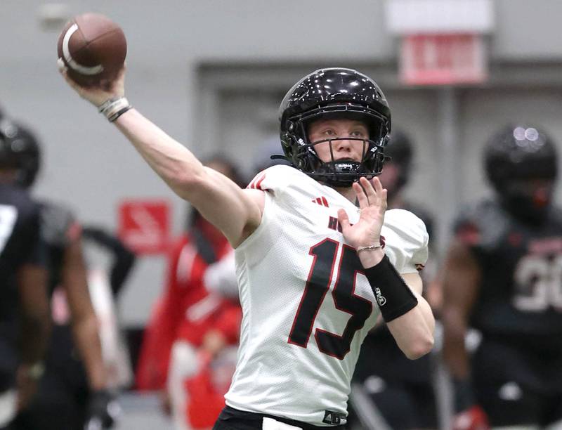 Northern Illinois University quarterback Josh Holst throws a pass Tuesday, March 26, 2024, during spring practice in the Chessick Practice Center at NIU.