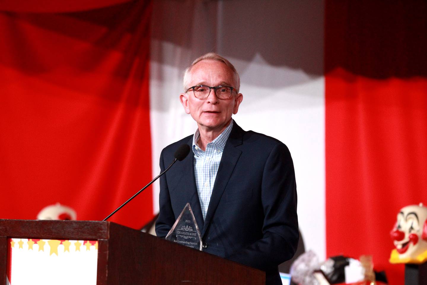 Mark Koenen accepts the 2024 Charlemagne Award during the 56th Annual Charlemagne Awards Dinner hosted by the St. Charles Chamber of Commerce at the Q Center in St. Charles on Friday, May 17, 2024.