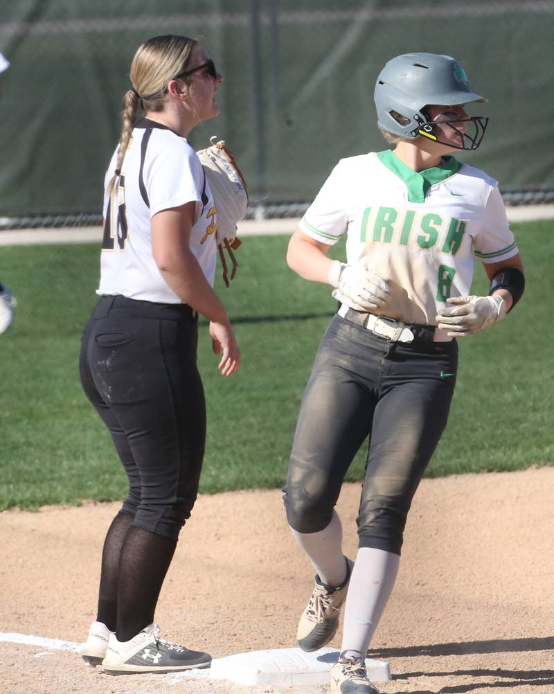 Seneca's Sam Vandevelde stands on third base while Putnam County's Reise Zeller watches the ball on Thursday April 13, 2023 at Seneca High School.