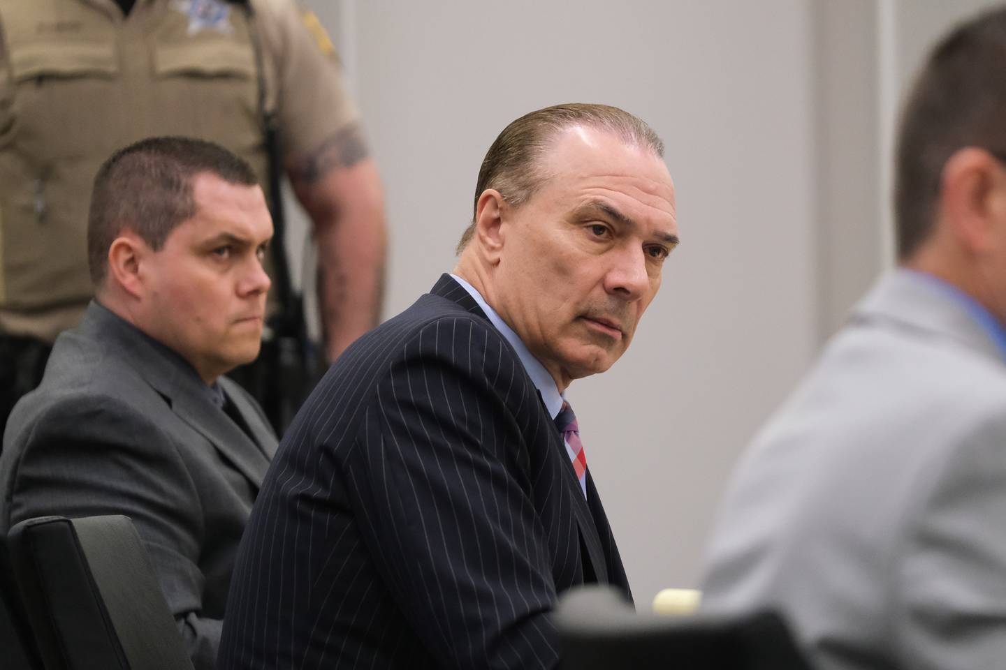 Defense attorney Chuck Bretz talks to the prosecuting team during the Jeremy Boshears trial. Boshears is charged with the murder of Kaitlyn “Katie” Kearns, 24, on Nov. 13, 2017. Monday, April 25, 2022, in Joliet.