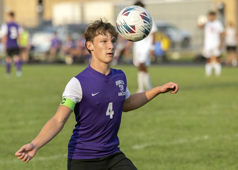 Dixon’s Jack Redell eyes the ball against Oregon Wednesday, Sept. 11, 2024, at EC Bowers field in Dixon.