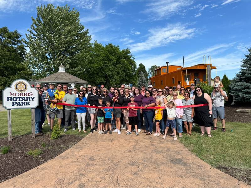 The Rotaract Club of Morris held an open house June 7 celebrating the new club. A Grundy County Chamber of Commerce & Industry ribbon cutting was held with the club at Rotary Parkin Morris to help spread the word on the new organization.