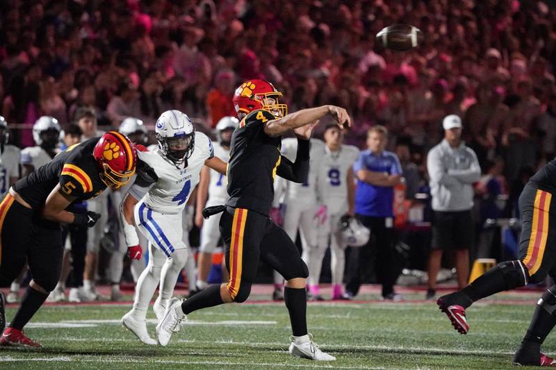 Batavia's Bodi Anderson (4) throws a pass against Geneva during a football game at Batavia High School on Friday, Oct. 4, 2024.