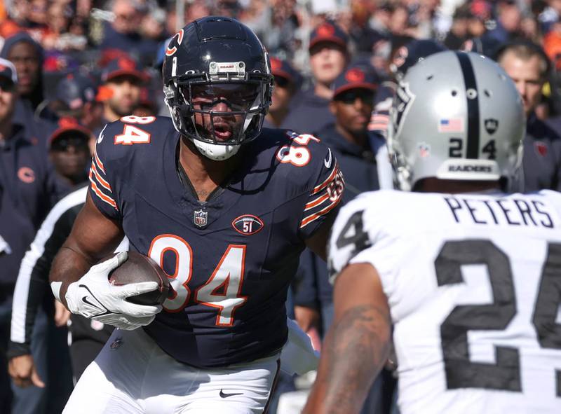Chicago Bears tight end Marcedes Lewis looks to get by Las Vegas Raiders cornerback Marcus Peters after making a catch during their game Sunday, Oct. 22, 2023, at Soldier Field in Chicago.