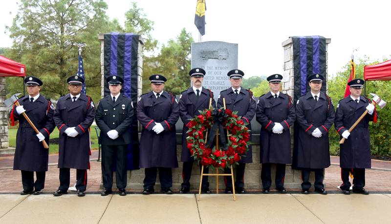 The St. Charles Fire Department Honor Guard stands by the Fire Department Memorial Wreath at the September 11th Remembrance Ceremony on Monday, Sept. 11, 2023 in St. Charles.