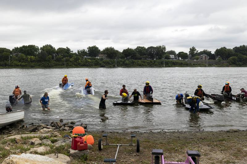 Racers line the banks Saturday, August 26, 2023 for the next heat in Rock Falls.