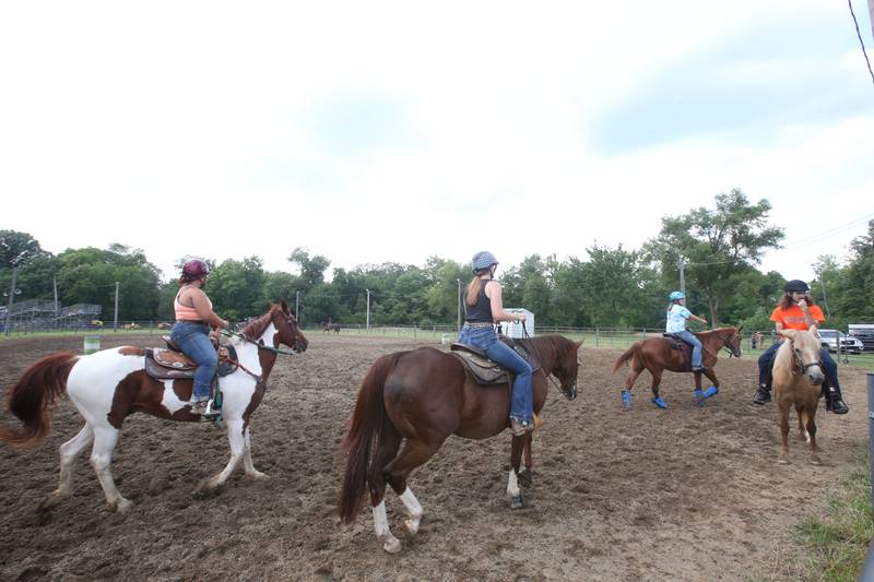 4-H kids ride horses during the La Salle County 4-H Fair on Thursday, July 11, 2024 in Ottawa.