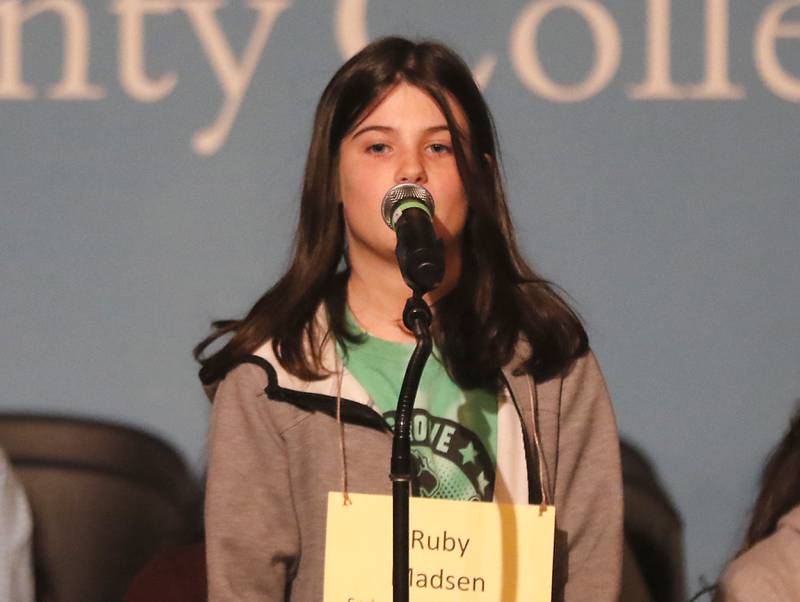 Ruby Madsen of Spring Grove Elementary School competes in the McHenry County Regional Office of Education's 2023 spelling bee Wednesday, March 22, 2023, at McHenry County College's Luecht Auditorium in Crystal Lake.