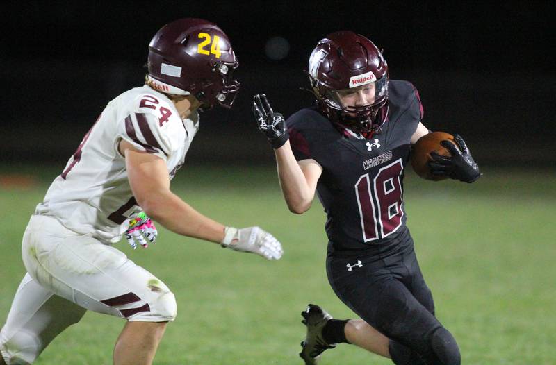 Marengo’s Deacan Grandinetti runs with the ball against Richmond Burton in varsity football at Rod Poppe Field on the campus of Marengo High School in Marengo on Friday, Oct. 18, 2024.