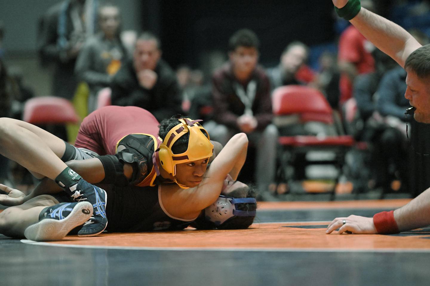 Lockport’s Morgan Turner pins Joliet Catholic’s Eliana Paramo in the 110-pound bout at the girls wrestling state finals at Grossinger Motor Arena in Bloomington on Saturday, Feb. 24, 2024.