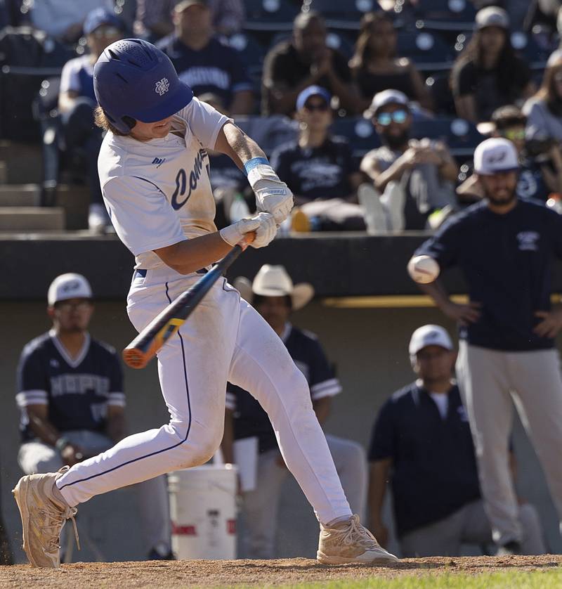 Newman’s Garet Wolfe drives in a run against Chicago Hope Monday, May 27, 2024 during the Class 2A super-sectional in Rockford.