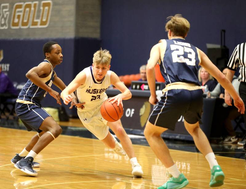 Serena’s Tanner Faivre (center) drives toward the basket during the Class 1A Harvest Christian Academy Sectional semifinal game against Harvest Christian Academy on Wednesday, Feb. 28, 2024 in Elgin.