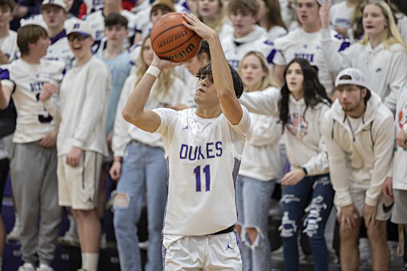 Dixon’s Wyatt Wetzell puts up a three-pointer Monday, Dec. 5, 2022 in a game against Rochelle.