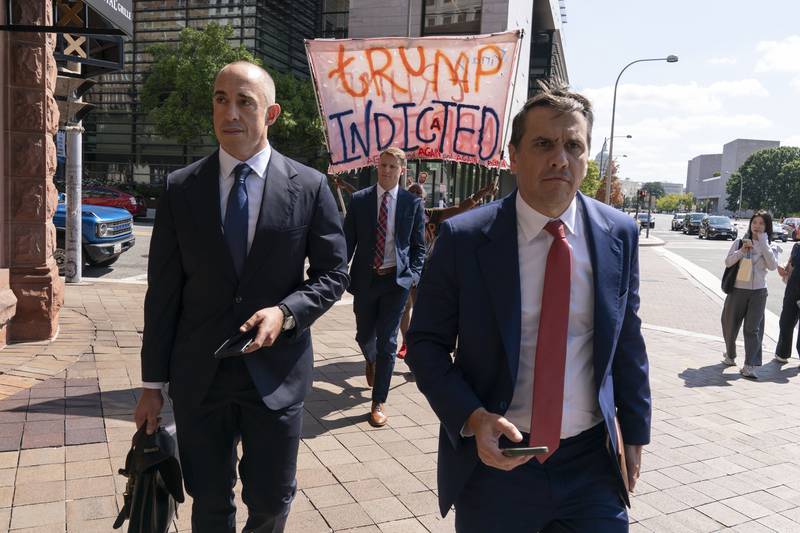 Former President Donald Trump attorneys Emil Bove, left, and Todd Blanche leave the U.S. Federal Courthouse, after a hearing, Thursday, Sep. 5, 2024, in Washington. A judge is hearing arguments about potential next steps in the federal election subversion prosecution of Donald Trump in the first hearing since the Supreme Court narrowed the case by ruling that former presidents are entitled to broad immunity from criminal charges. (AP Photo/Jose Luis Magana)