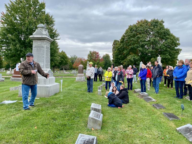 Joe McCormick, a Sycamore High School history teacher, presents about the Dayton Ward family, a multi-generational family who played a significant role in the local agricultural community. McCormick spoke at the DeKalb County History Center’s annual Etched in Stone Cemetery Walk at Elmwood Cemetery, 901 S. Cross St., Sycamore on Sunday, Oct. 8, 2023.