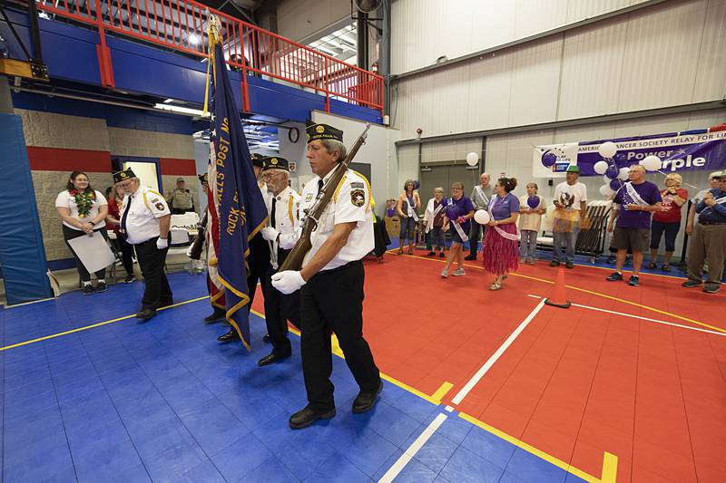 The Rock Falls American Legion color guard leads a procession of cancer survivors Saturday, June 8, 2024 during the Relay for Life of Sauk Valley event in Sterling.