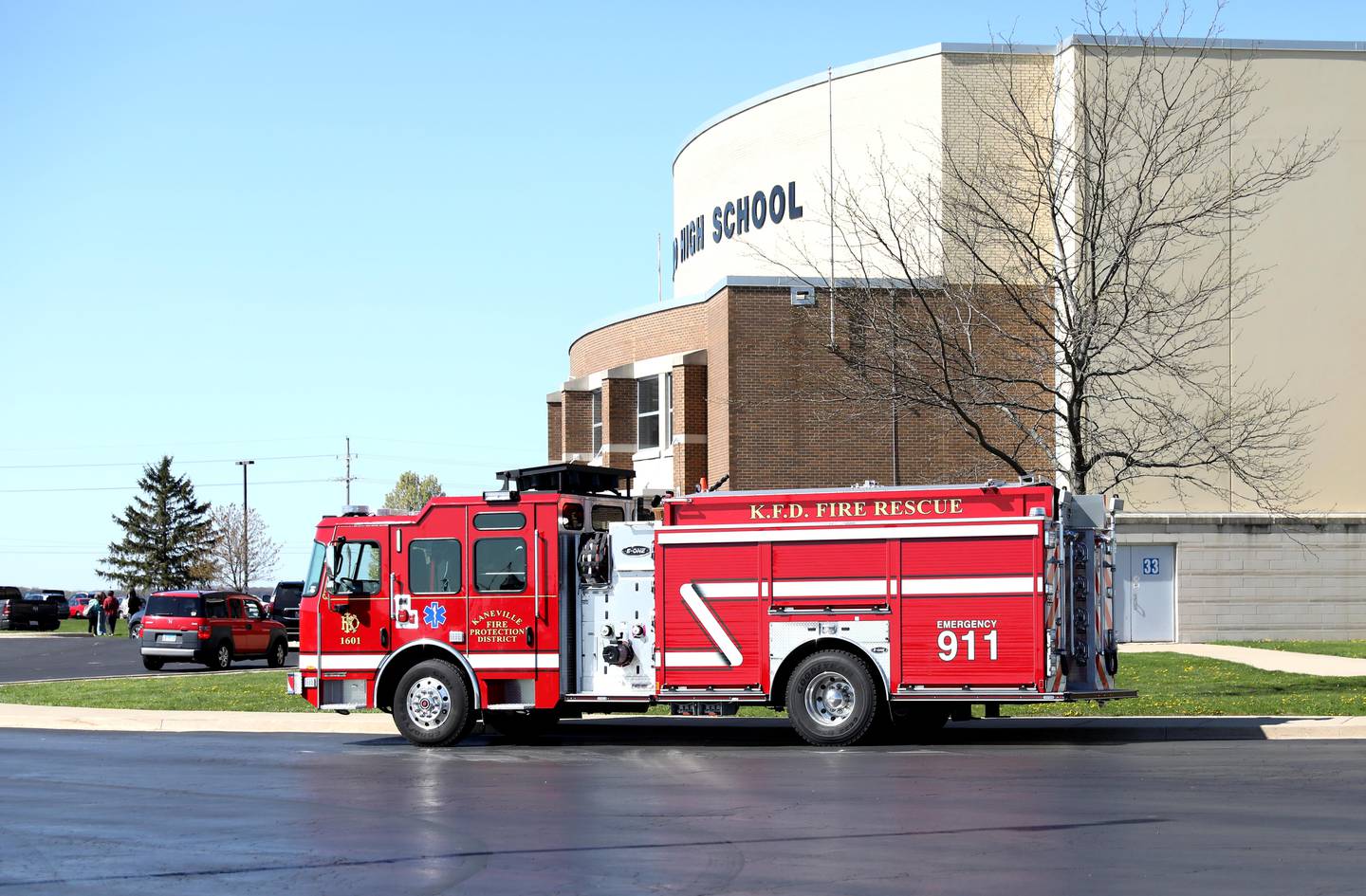 A fire truck sits outside Kaneland High School in Maple Park on May 3, 2023 after a small fire was reported in a bathroom. All students and staff were evacuated, and classes were canceled for the rest of the day.